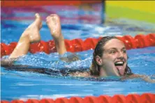  ?? Tibor Illyes / MTI / Associated Press ?? Hungary’s Katinka Hosszu celebrates after winning the women’s 200 meter individual medley in Budapest.