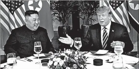  ?? SAUL LOEB/GETTY-AFP ?? North Korean leader Kim Jong Un and President Donald Trump sit for dinner Wednesday in Hanoi, Vietnam.