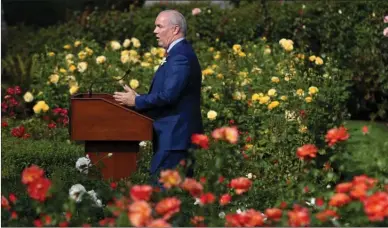  ?? The Canadian Press ?? Premier John Horgan holds a press conference from the rose garden at the Legislatur­e following the speech from the throne in Victoria on Friday.