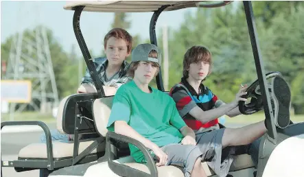  ?? AARON YEGER/ THE CANADIAN PRESS ?? Nate (Nick Serino), at the wheel, Riley (Reece Moffett), in the passenger seat, and Adam (Jackson Martin), star in Sleeping Giant, by Ontario-bred director Andrew Cividino. The teenage drama, a timeless love letter to adolescenc­e, can already be...