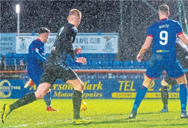  ??  ?? THAT SETTLES IT: Inverness attacker Miles Storey, left, strikes with 73 minutes of the tie played to send Caley Jags into the Challenge Cup final yet again
