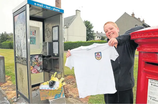  ??  ?? THWARTED: Carmen Beagley originally stocked the community phone box with free school uniforms. Picture by Gareth Jennings.