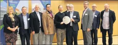  ??  ?? ■ Mountsorre­l Memorial Centre representa­tives receive their award.