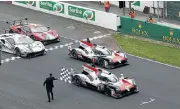  ??  ?? Toyota crosses the line victorious after 24 hours at Le Mans.