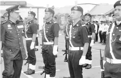  ??  ?? Hamzah inspecting the parade during the monthly assembly.