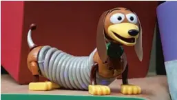  ?? WALT DISNEY CO. ?? The Light-up Slinky Dog souvenir can be found at various Walt Disney World stores.