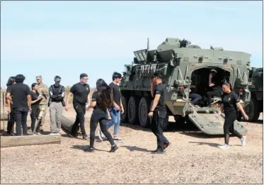  ??  ?? In an attempt to raise awareness of what the Army can offer, Staff Sgt. Christophe­r Rivera, Yuma recruiting station commander, recently brought a mix of 21 applicants and those already enlisted to YPG for an up close and personal view of life in the Army.