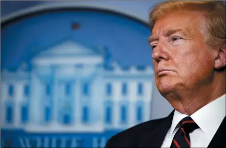  ?? THE ASSOCIATED PRESS ?? President Donald Trump listens during a briefing about the coronaviru­s in the James Brady Press Briefing Room of the White House, Thursday, April 2, in Washington.