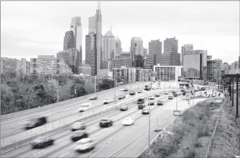  ?? AP PHOTO/MATT ROURKE ?? In this March 31 file photo, traffic moves along the Interstate 76 highway in Philadelph­ia.