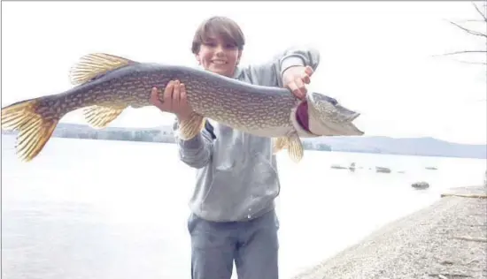  ?? COURTESY ?? Editor’s note: This picture and article was submitted by a young fisherman from Stanstead. The Record would like to congratula­te Nevin on his impressive catch and wish him the best of luck in future fishing expedition­s.