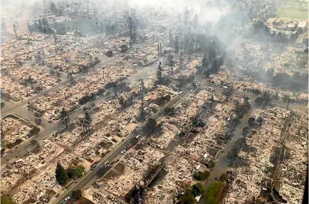  ?? PHOTO: REUTERS ?? The North Bay wildfires north of San Francisco have left block after block of burned-out properties.