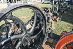  ??  ?? The curved spokes on the flywheel is one giveaway visual for a Hornsby-akroyd. Apparently, spinning it by hand or foot a little easier with curved spokes.