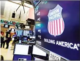  ??  ?? In this file photo the logo for Union Pacific appears above a trading post on the floor of the New York Stock Exchange. (AP)