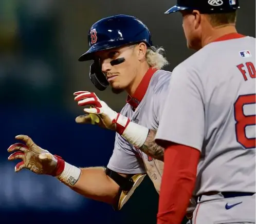  ?? GODOFREDO A. VÁSQUEZ/ASSOCIATED PRESS ?? Red Sox leadoff hitter Jarren Duran stole second base three times in the first three innings Monday vs. the A’s.