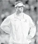  ?? Harry How / Getty Images ?? Lane Kiffin has drawn praise for developing a spread look for Alabama’s offense, which is averaging 39.4 points per game in the Tide’s undefeated season.