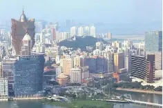 ??  ?? Casinos of Wynn and SJM Holdings are seen in a general view of Macau, China. A company linked to US President Donald Trump has been granted approval from the Chinese territory of Macau for additional trademarks, including casino services, to develop...