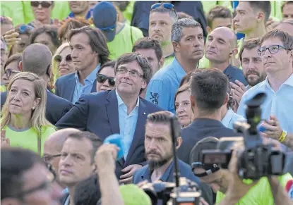  ?? Lluis gene/afp ?? Puigdemont, el líder catalán que desafía la unidad de España, durante la Diada