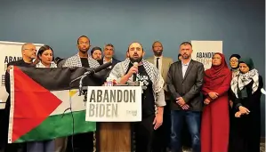  ?? (#Abandonbid­en via AP) ?? In this image taken from video, Muslim community leaders from several swing states pledge to withdraw support for U.S. President Joe Biden on Saturday at a conference in Dearborn, Mich., citing his refusal to call for a cease-fire in Gaza.
