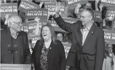  ?? AP Photo/Jacquelyn Martin, File ?? ■ Democratic presidenti­al candidate Sen. Bernie Sanders, I-Vt., his wife, Jane Sanders, and his son Levi Sanders arrive March 1, 2016, at a primary night rally in Essex Junction, Vt.