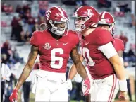  ?? Gary Cosby Jr. / Associated Press ?? Alabama wide receiver DeVonta Smith (6) and quarterbac­k Mac Jones celebrate a touchdown pass against Mississipp­i State on Oct. 31.