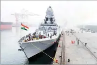  ?? PTI ?? The Indian navy destroyer Kolkata docks at a port in Qingdao in eastern China's Shandong Province, Sunday