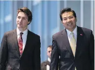  ?? JUSTIN TANG / THE CANADIAN PRESS ?? Prime Minister Justin Trudeau with China’s ambassador to Canada, Luo Zhaohui, right, in Ottawa in January. “(In) China, we’ve got a long way to go to improve the human rights situation...”, Luo said last week.