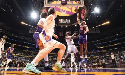  ?? Photograph: Andrew D Bernstein/ NBAE/Getty Images ?? The Staples Center has been a famous venue for sports and other entertainm­ent since opening in 1999.