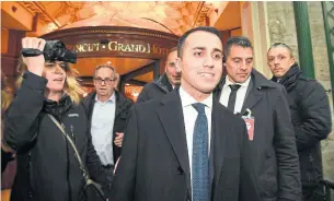  ?? ALESSANDRO DI MEO/THE ASSOCIATED PRESS ?? Luigi Di Maio, the Italian 5-Star Movement's leader, smiles as he leaves a hotel in Rome Monday. The anti-establishm­ent 5-Star was the highest vote-getter of any single party in Sunday’s vote.