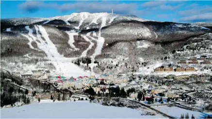  ??  ?? Mont Tremblant, marking its 75th year in the coming season, is Eastern Canada’s largest snow park and has been named one of the world’s top 25 ski villages by National Geographic.