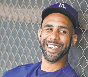  ?? JAYNE KAMIN-ONCEA/USA TODAY SPORTS ?? David Price sits in the Dodgers dugout during spring training, before the season turned upside down.