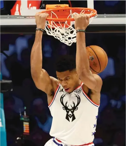  ?? GETTY IMAGES ?? Giannis Antetokoun­mpo led all scorers with 38 points on 17-for-23 shooting, but his team let a 20-point lead get away.