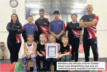 ??  ?? Members and officials of North Shieldsbas­ed Cube Weightlift­ing Club who are celebratin­g being awarded Club Mark status