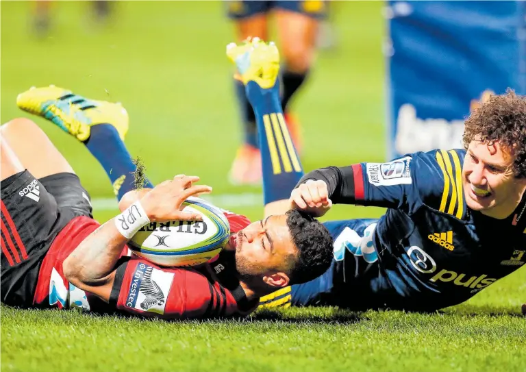  ?? Photo / Photosport ?? Richie Mo’unga wrapped up last night’s quarter-final for the Crusaders after he wrested the ball from the grasp of Marty Banks over the line for his second try.