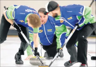  ?? TIM KROCHAK/THE CHRONICLE HERALD ?? Chad Stevens eyes his shot during his match against the Jamie Murphy rink, at the Nova Scotia provincial tankard curling championsh­ips at the Dartmouth Curling Club on Friday.