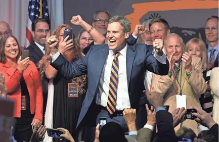  ??  ?? Gov.-elect Bill Lee celebrates his victory with supporters during an election party Tuesday at the Factory in Franklin. SHELLEY MAYS/THE TENNESSEAN