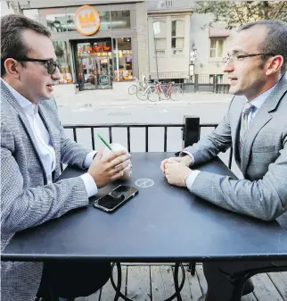  ?? JOHN MAHONEY ?? Lawyer Joey Zukran, right, with client Martin Banoon in Montreal Monday. The two are seeking to launch a classactio­n lawsuit against Airbnb over service fees tagged on to nightly rental rates.