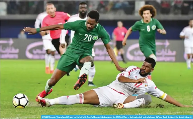  ??  ?? KUWAIT: Emirates’ Fares Saadi (R) vies for the ball with Saudi’s Mukhtar Fallatah during the 2017 Gulf Cup of Nations football match between UAE and Saudi Arabia at the Sheikh Jaber AlAhmad Stadium. — AFP