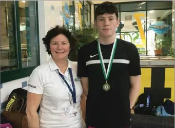 ??  ?? Proud mum Katie Maher and her son Anthony, who won Gold and two Silver medals.