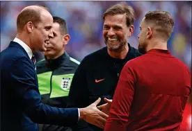  ?? ?? TARGET: William greets Liverpool’s Jurgen Klopp and Jordan Henderson