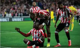  ?? Ian Tuttle/Shuttersto­ck ?? Yoane Wissa celebrates his late equaliser in the thrilling 3-3 draw with Liverpool. Photograph: