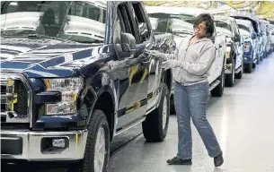  ?? CHARLIE RIEDEL/THE ASSOCIATED PRESS FILE PHOTO ?? Punitive tariffs on U.S. imports of vehicles and parts would hurt the industry’s competitiv­eness.