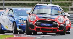  ??  ?? BIG FIGHT. The season-long GTC2 fight between the Mini JCW and Golf Gti camps should be continued.