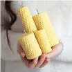  ?? ?? Beeswax candles.
| Pexels