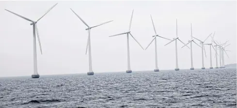  ??  ?? Middelgrun­den offshore wind farm is pictured outside Copenhagen on Nov 27, 2019. The EU plans to splash out a billion euros on emissions-cutting technologi­es.