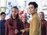  ?? KIMBERLEY FRENCH, PARAMOUNT ?? Uhura (Saldana) and Sulu (Cho) carry forward the original Star Trek’s social message.