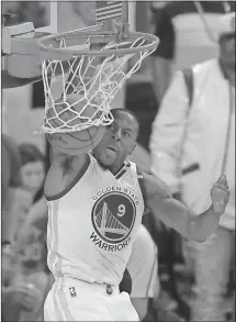  ?? File, Ben Margot / The Associated Press ?? Golden State Warriors forward Andre Iguodala re-signs with the Golden State Warriors to stay as a key backup ready to chase another title.