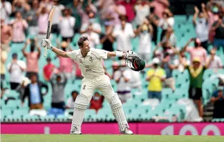  ?? GETTY IMAGES ?? Australian batsman Steve Smith celebrates a return to form with a century against India at the SCG yesterday.