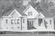  ?? Doug Walker / Rome News-Tribune ?? This new home in the Battle Farm subdivisio­n is part of the healthy supply of local homes at higher price points.