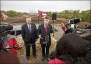  ?? STEPHEN B. MORTON / GEORGIA PORTS AUTHORITY ?? GPA Board Chairman Jimmy Allgood (left) and GPA Executive Director Griff Lynch attend Tuesday’s groundbrea­king on the Mason Mega Rail Terminal at the Port of Savannah.