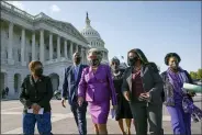  ?? J. SCOTT APPLEWHITE - THE ASSOCIATED PRESS ?? Members of the Congressio­nal Black Caucus walk to make a make a statement on the verdict in the murder trial of former Minneapoli­s police Officer Derek Chauvin in the death of George Floyd, on Capitol Hill in Washington, Tuesday, April 20, 2021. From left are Rep. Karen Bass, D-Calif., Rep. Andre Carson, D-Ind. Rep. Joyce Beatty, D-Ohio, chair of the Congressio­nal Black Caucus, Rep. Brenda Lawrence, D-Mich., Rep. Cori Bush, D-Mo., and Rep. Sheila Jackson Lee, D-Tex.